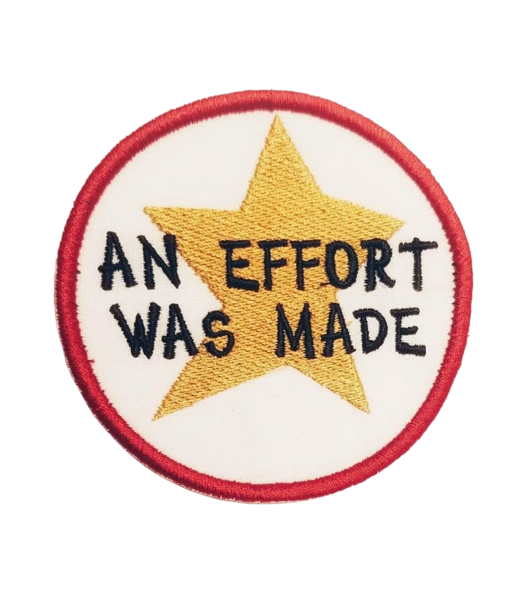 An embroidered patch that says: An effort was made